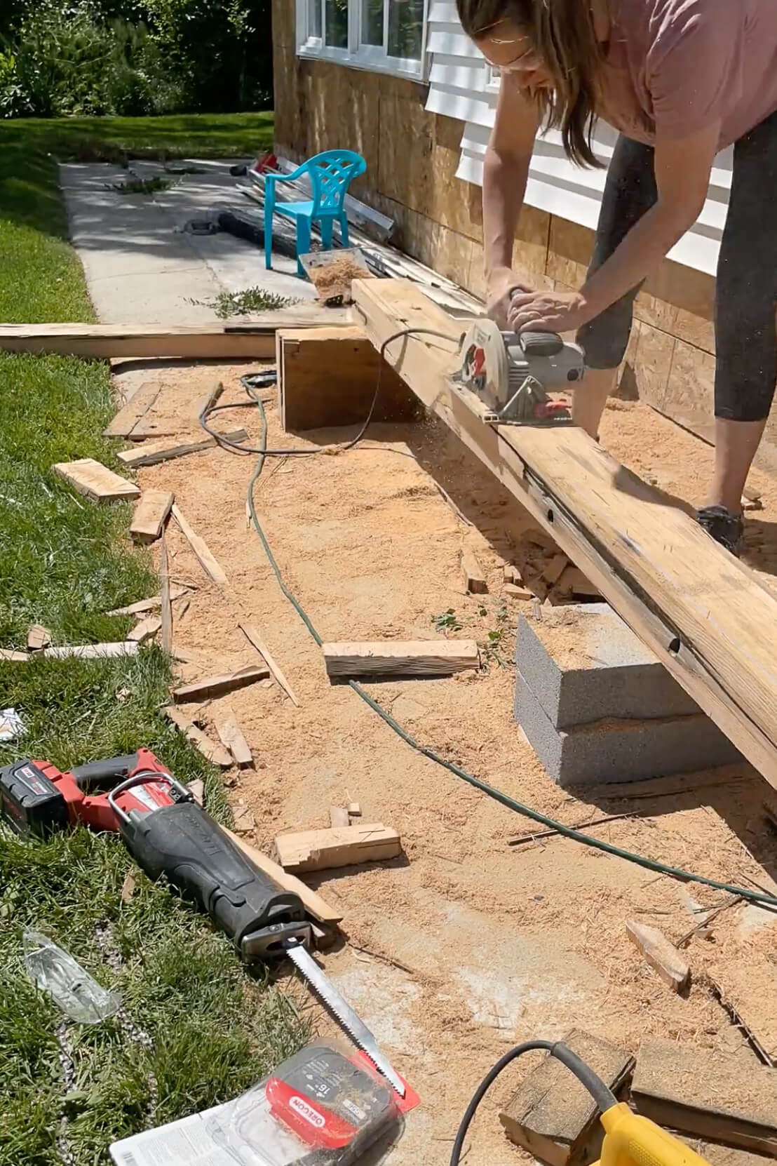 Planing and sanding an old mantle to make it smaller and thinner.